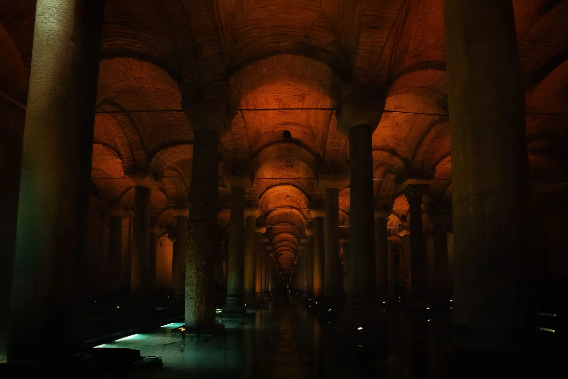 The dimly lit column corridor of the Basilica Cistern The dimly lit column corridor of the Basilica Cistern