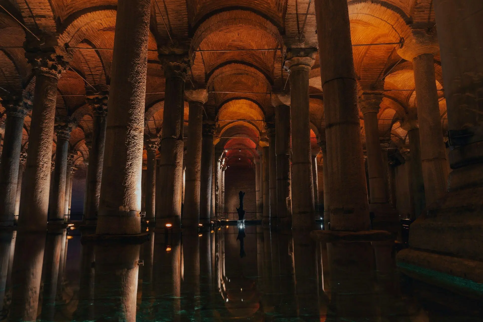 The columns of the Basilica Cistern mirrored in the shallow water